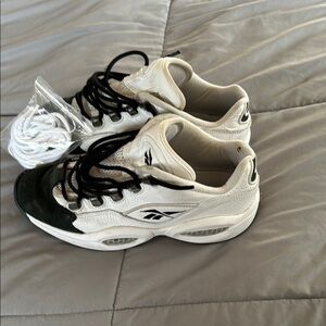 Allen Iverson’s Reebok Questions in 
 White and Black size 9.5